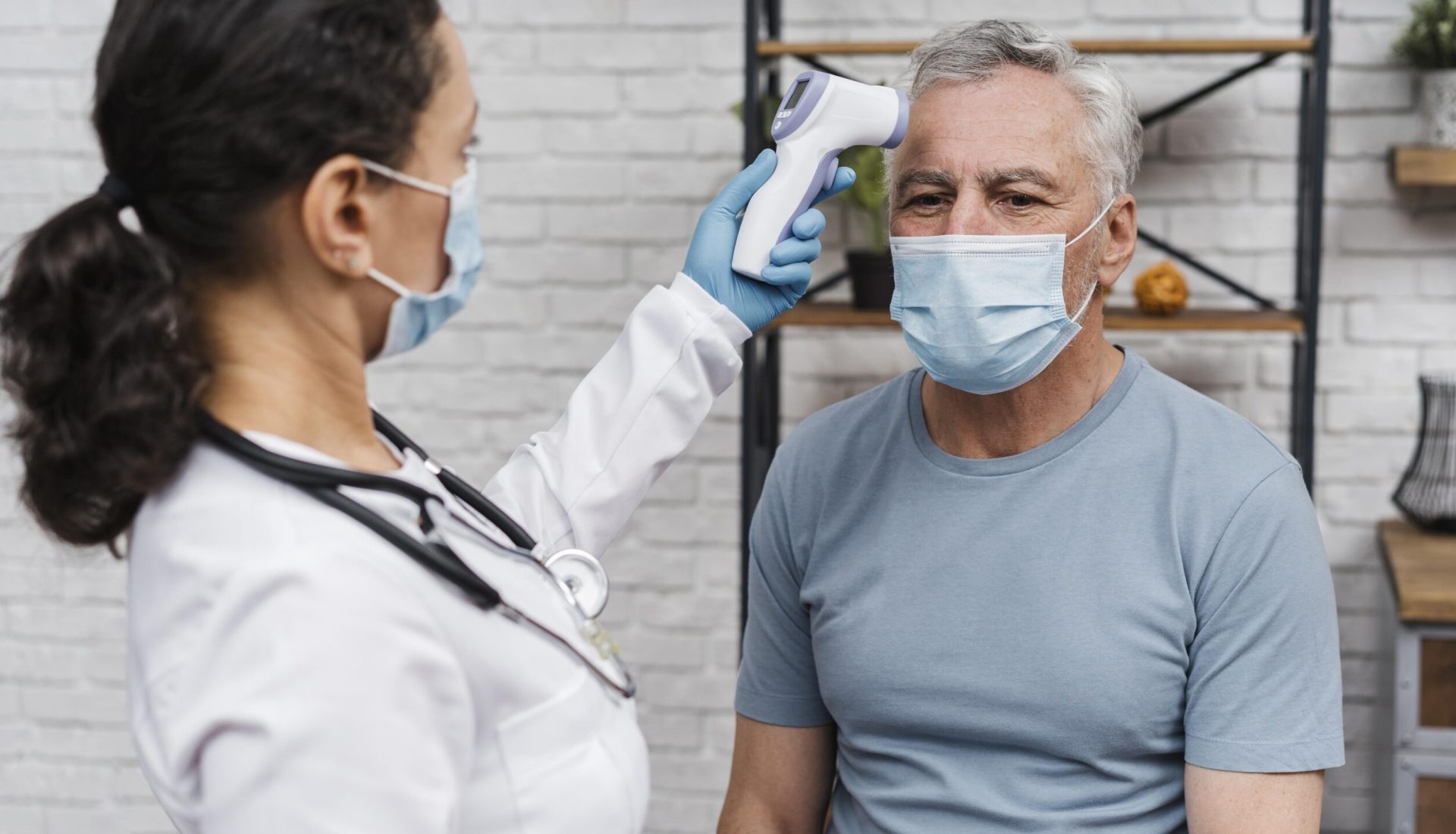 doctor-taking-patients-temperature