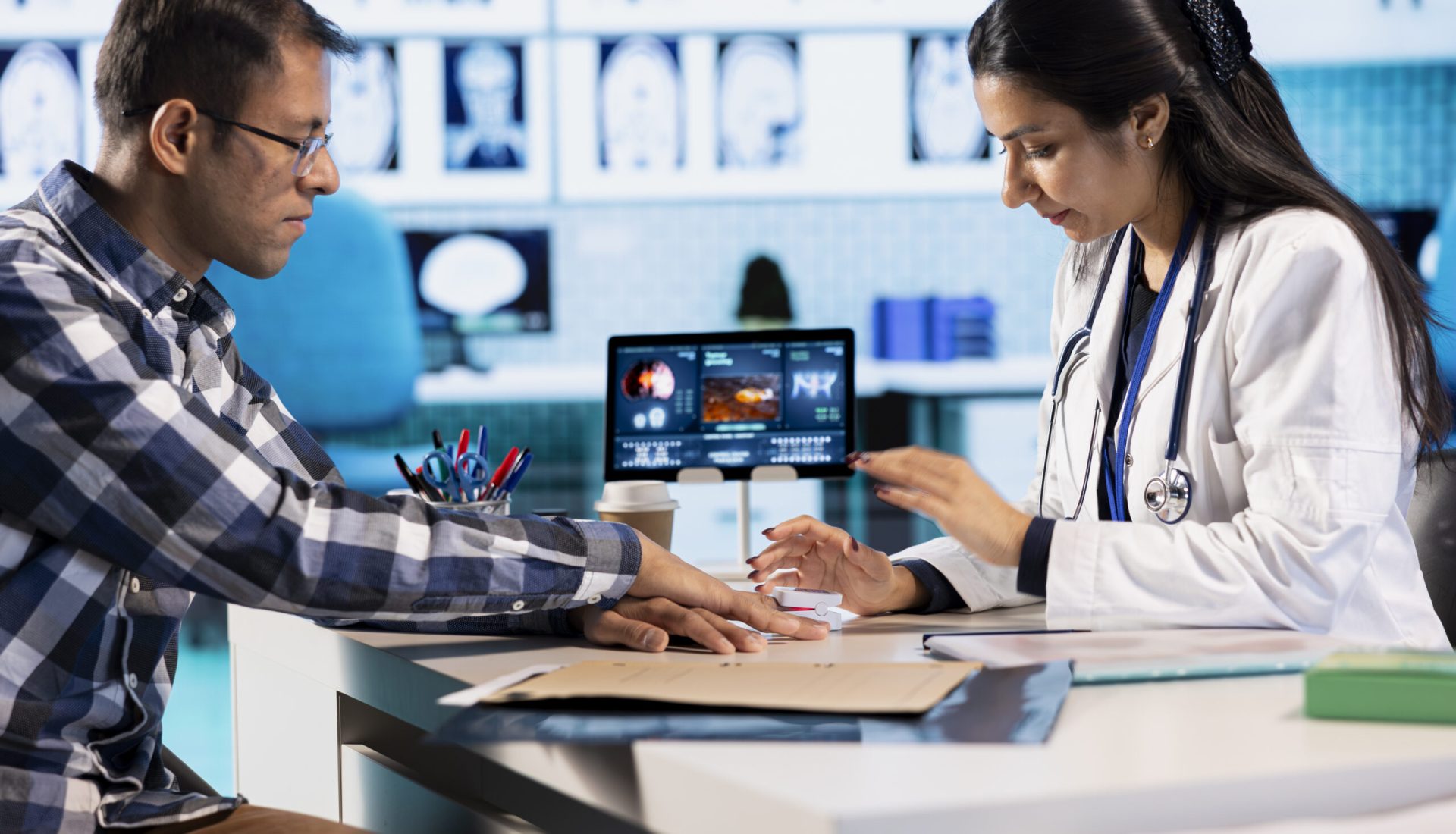 Healthcare professional uses an oximeter to measure the oxygen levels for a patient at check up, diagnostic tools for accurate medical advice. Monitoring pulse and saturation with indicator.